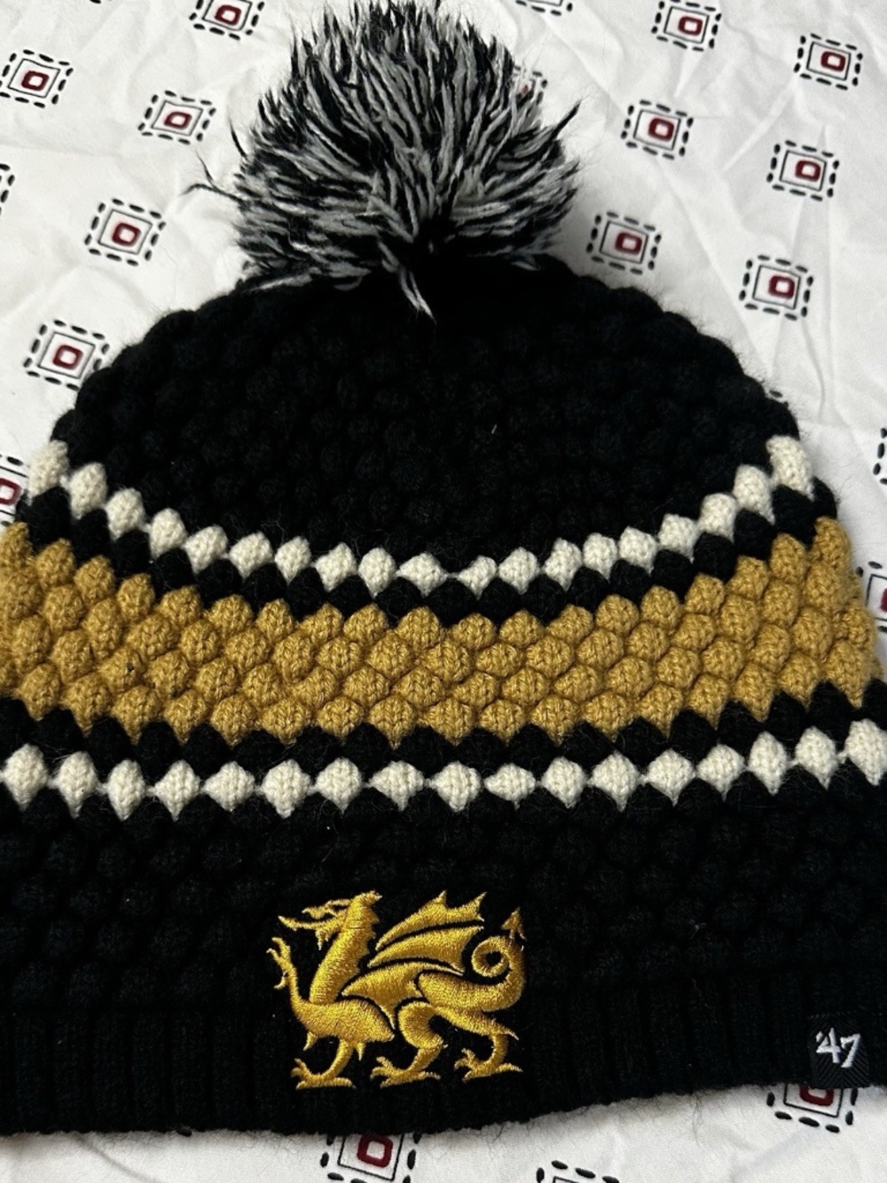 Cambria Women’s Winter Hat Logo Bubble Pattern Black Yellow White unisex puff